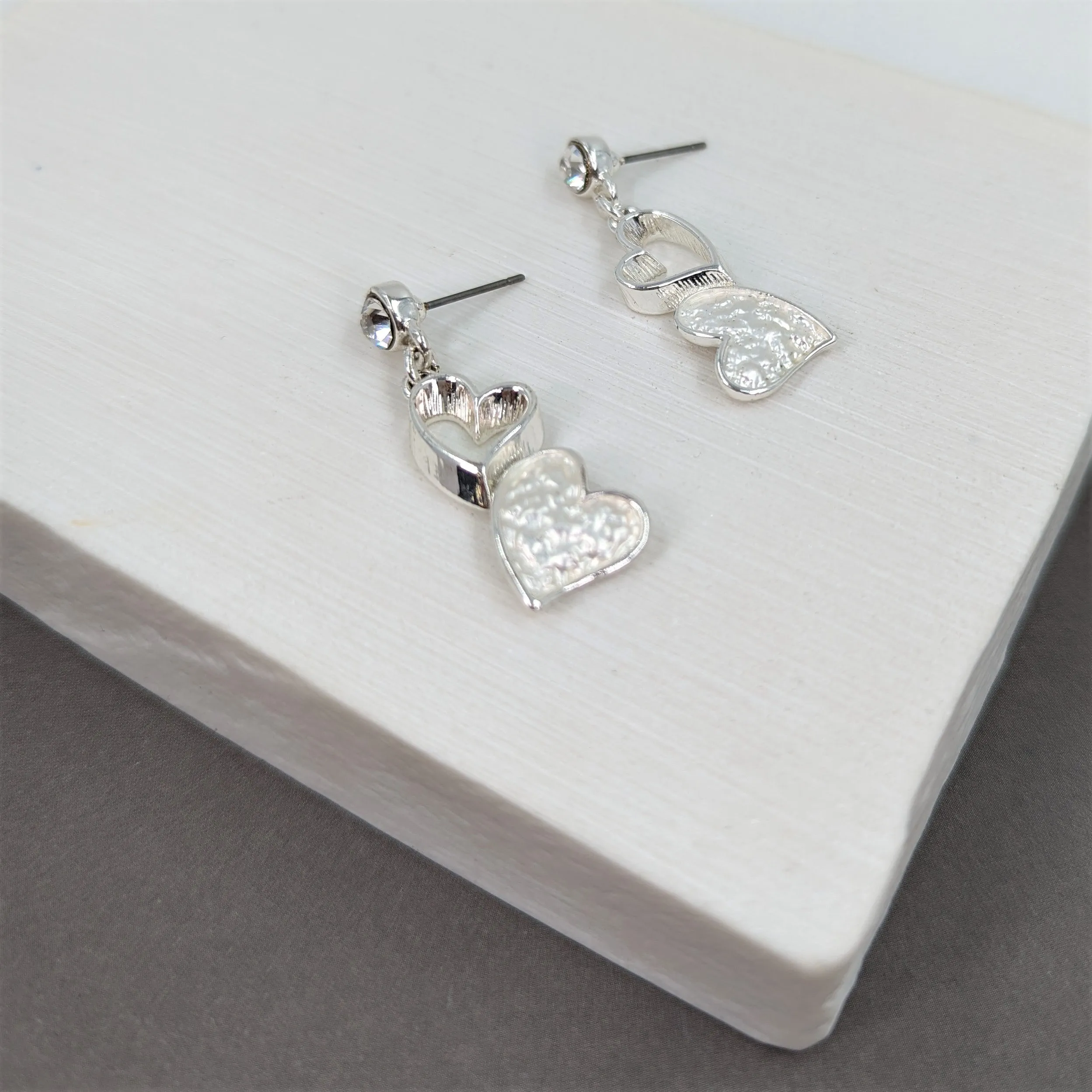 Drop heart studs